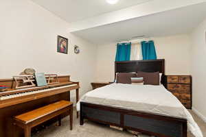 Bedroom with carpet flooring