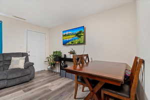 Dining room featuring light wood-type flooring