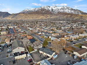 Birds eye view of property with a mountain view