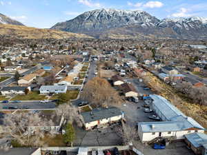 Birds eye view of property with a mountain view