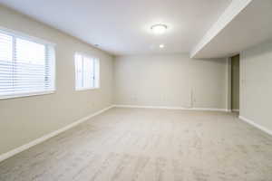 View of carpeted spare room