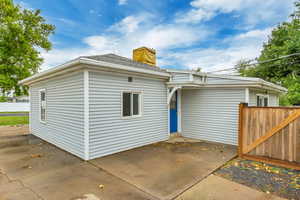 Rear view of house with a patio area