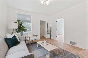 Living room featuring hardwood / wood-style flooring