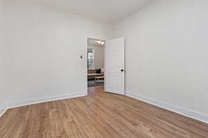 Primary Bedroom featuring light hardwood / wood-style flooring