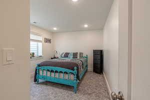 Bedroom featuring carpet flooring