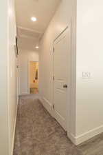 Corridor with dark carpet