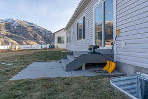 View of patio / terrace with a mountain view