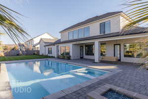 View of pool with a patio area