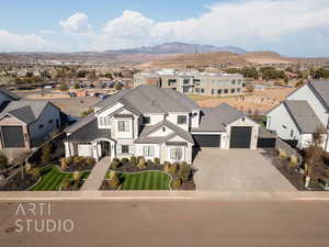 Birds eye view of property with a mountain view