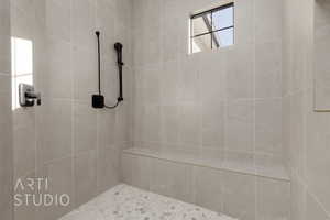 Bathroom with a tile shower