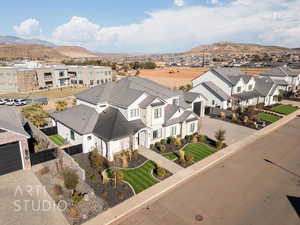 Birds eye view of property with a mountain view