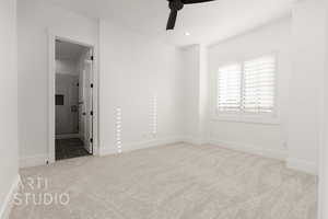 Unfurnished bedroom with light colored carpet, ceiling fan, and ensuite bathroom