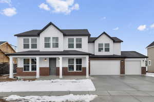 View of front facade with a garage