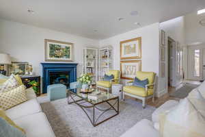 Living room with light hardwood / wood-style flooring