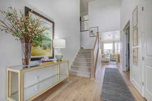 Foyer entrance with light hardwood / wood-style flooring