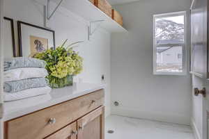 Laundry area featuring a mountain view