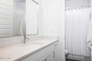 Bathroom with vanity and toilet