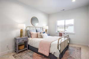 View of carpeted bedroom