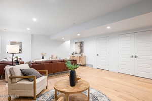 Living room with light wood-type flooring