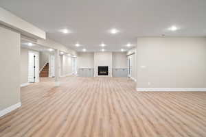 Unfurnished living room featuring light hardwood / wood-style floors