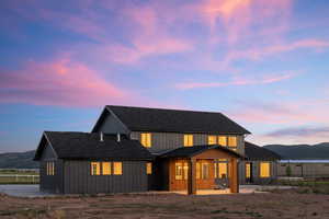 Back house at dusk with a mountain view