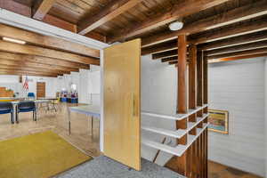 Basement featuring wooden ceiling