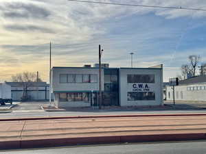 View of outdoor building at dusk