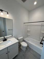 Full bathroom featuring tile patterned floors, vanity, shower / bathing tub combination, and toilet