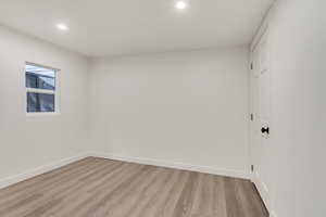 Empty room featuring light hardwood / wood-style floors