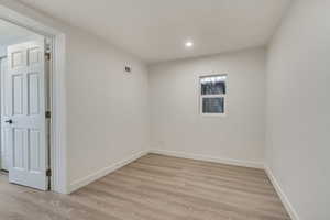 Unfurnished room featuring light hardwood / wood-style flooring