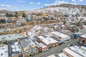 Snowy aerial view with a mountain view