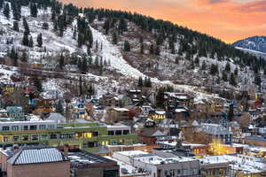 Snowy aerial view with a mountain view