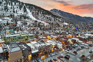 Snowy aerial view with a mountain view