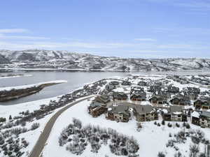 Snowy aerial view featuring a mountain view