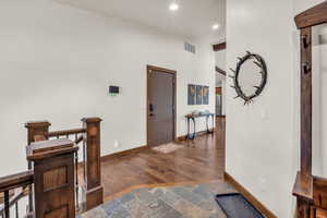 Hallway featuring dark hardwood / wood-style floors