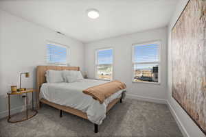 View of carpeted bedroom