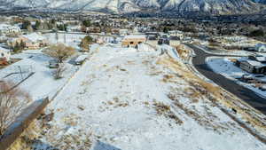 Snowy aerial view with a mountain view