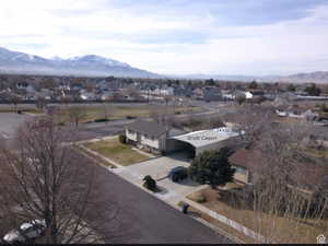Drone / aerial view featuring a mountain view and a residential view