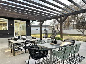 View of patio featuring outdoor lounge area and a pergola