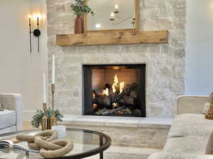 Details with a fireplace and hardwood / wood-style floors