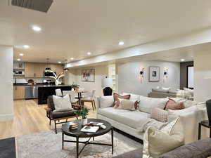 Living room featuring light hardwood / wood-style flooring