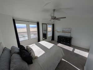 Master Bedroom with ceiling fan and great natural light