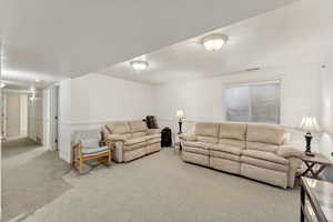 Living room with light colored carpet