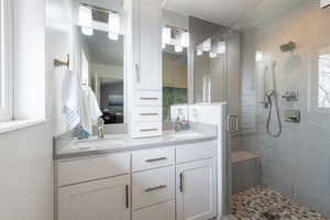 Bathroom with vanity and an enclosed shower