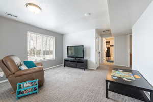 Living room featuring carpet flooring