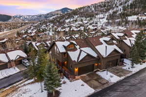 Snowy aerial view with a mountain view