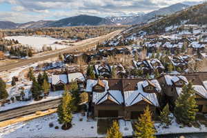 Snowy aerial view with a mountain view