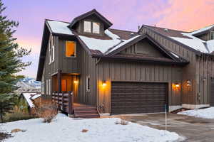 View of front facade featuring a garage