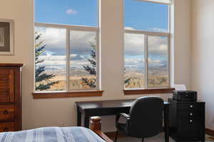 Bedroom featuring a mountain view