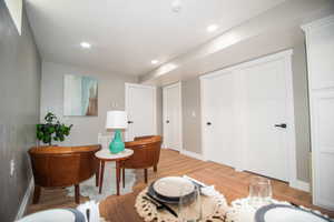 Living area featuring light hardwood / wood-style floors